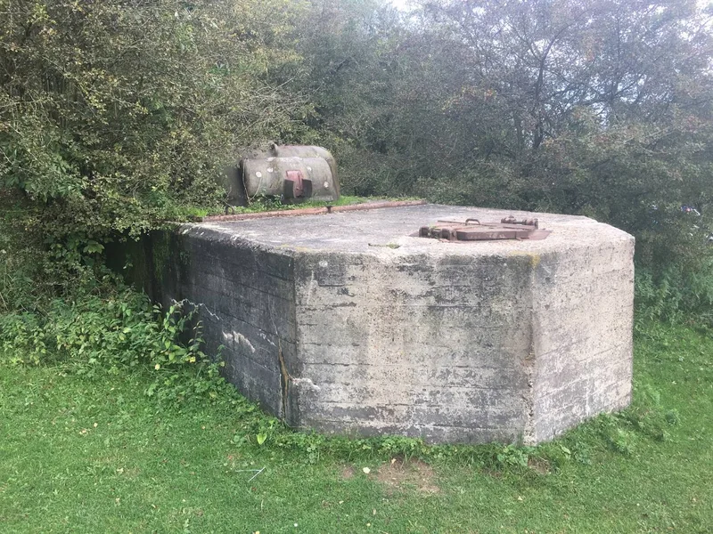 Concrete tank casemate at Meinerswijk with a steel hatch in the roof behind the turret